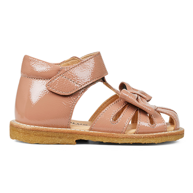 Starter sandal with a bow and velcro closure