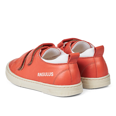 Sneaker with adjustable velcro closure