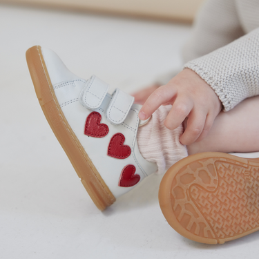 Sneaker with heart applications and velcro closure