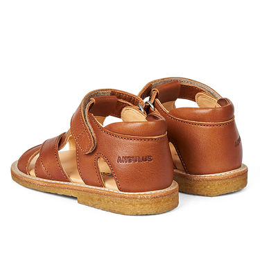 Cross sandal with open toe and velcro closure