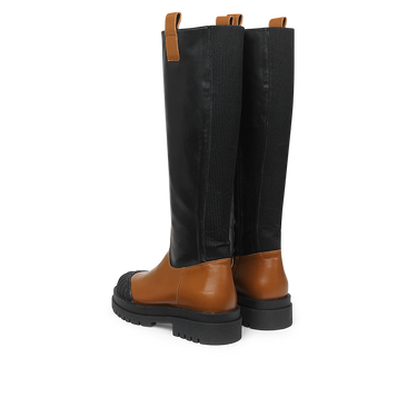 High shaft boot with zipper